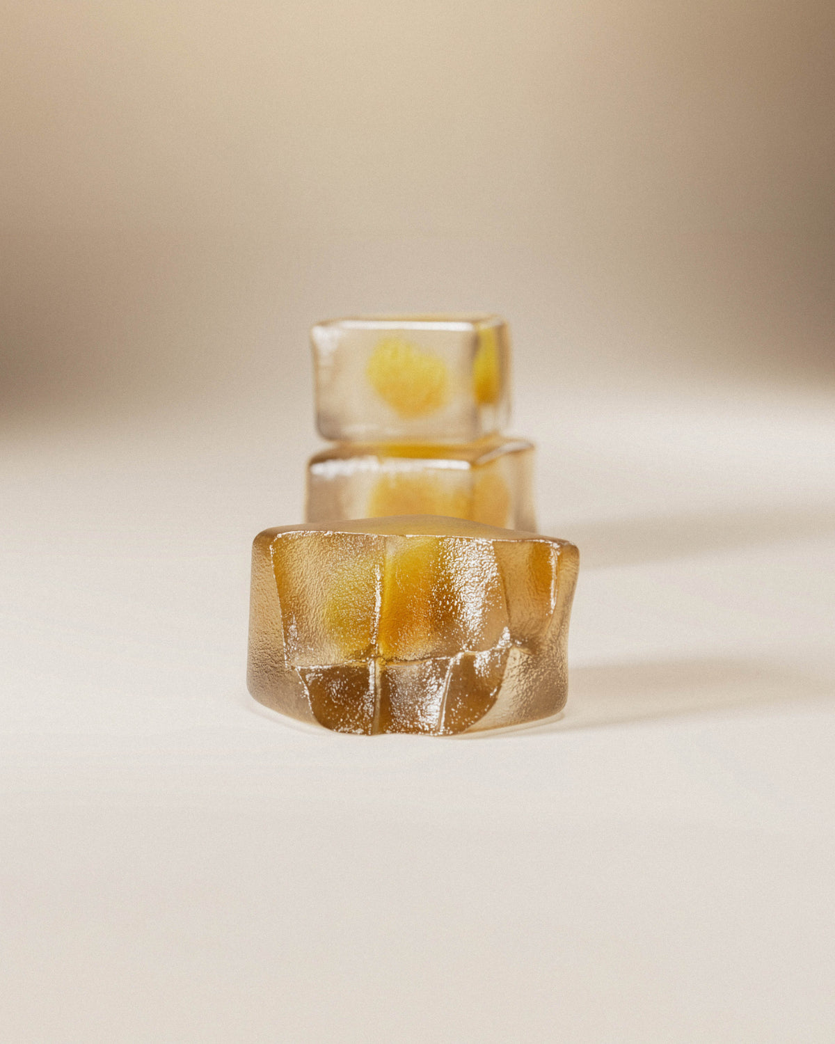 Close-up of stacked glow gummies