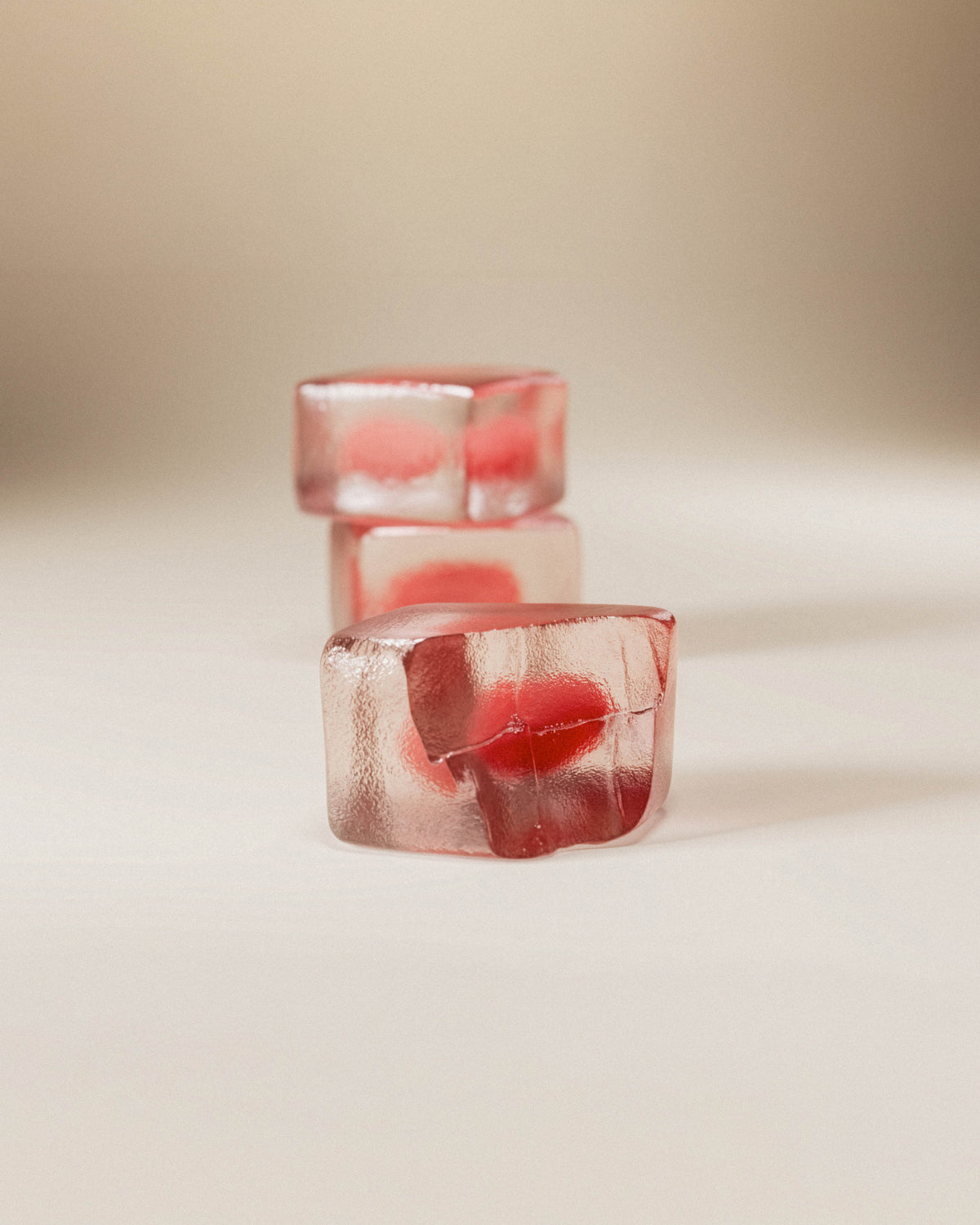 Close-up of stacked intimate gummies