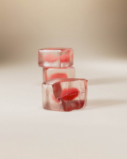 Close-up of stacked intimate gummies
