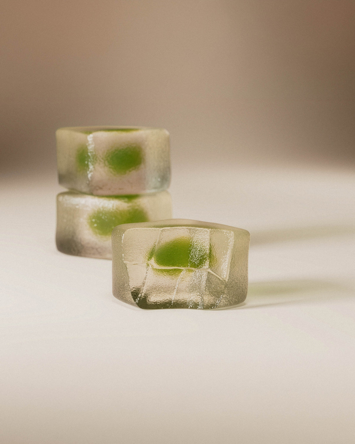 Close-up of stacked debloat gummies